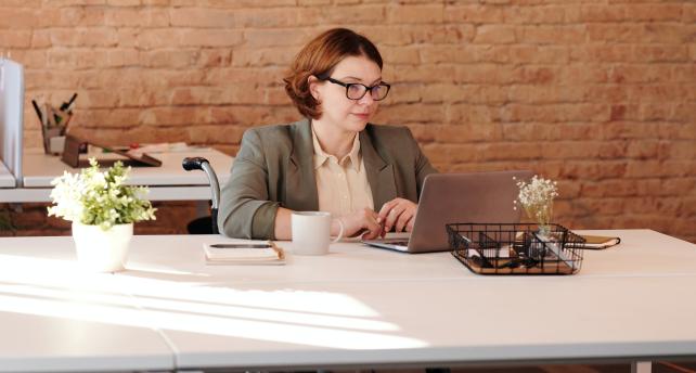 Women working at office desk