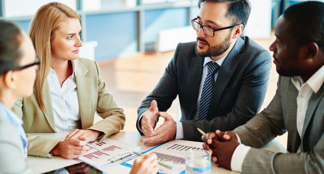 Coworkers having conversation